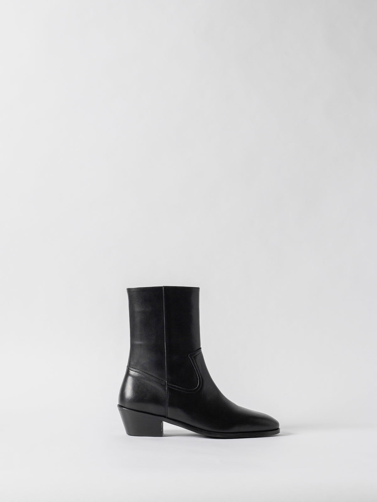 Black ankle boot on a white background
