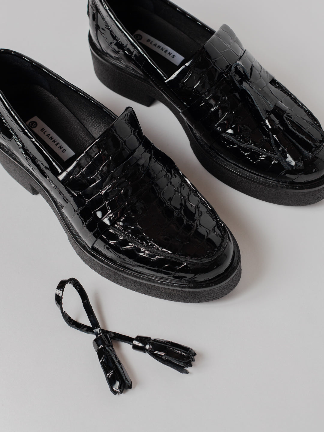 Blankens The Johanna black croc loafer with black tassel platform sole