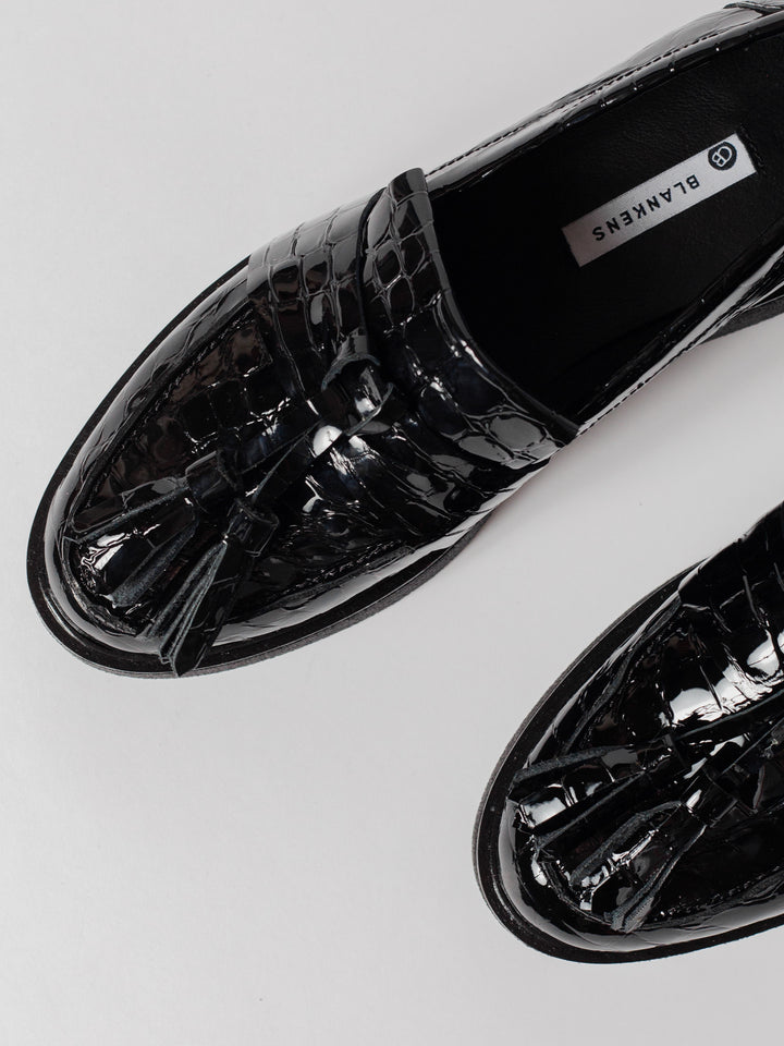 Blankens The Johanna black croc loafer with black tassel platform sole