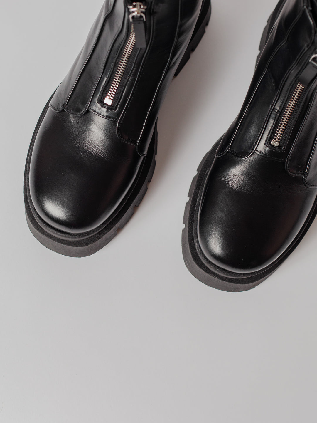 Blankens The Thilda. chunky sole, zipper in front. black leather. 
