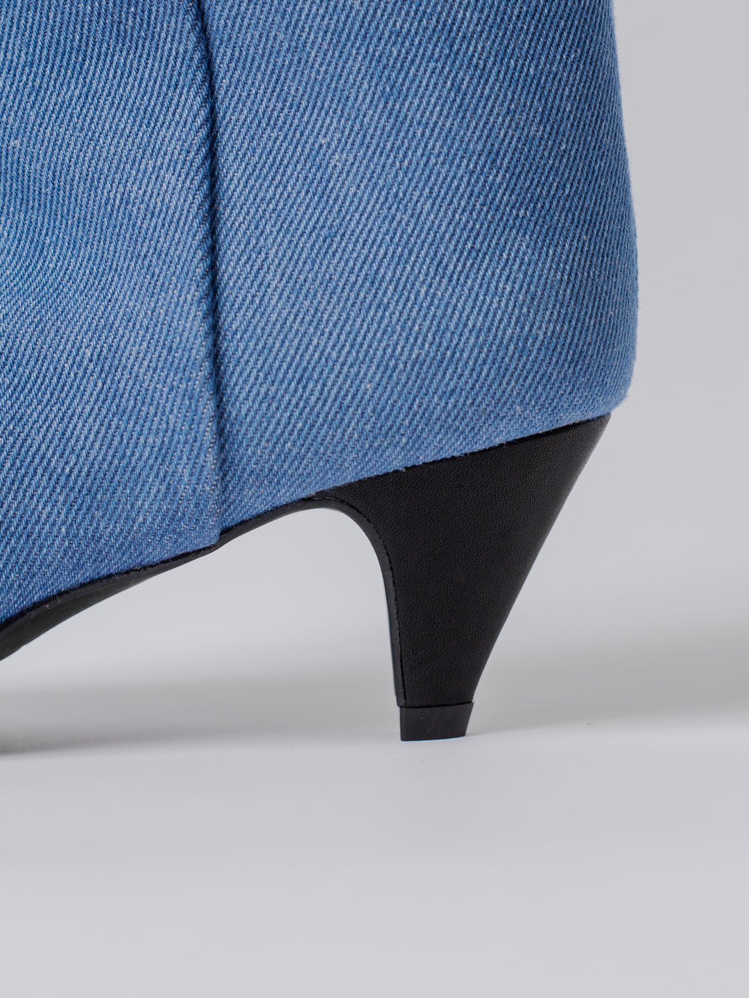 Blankens The Vanessa Tall Denim. high boot, walkable heel height. straight shaft. Rubber mix sole. Inner lining in leather. detail photo of the heel