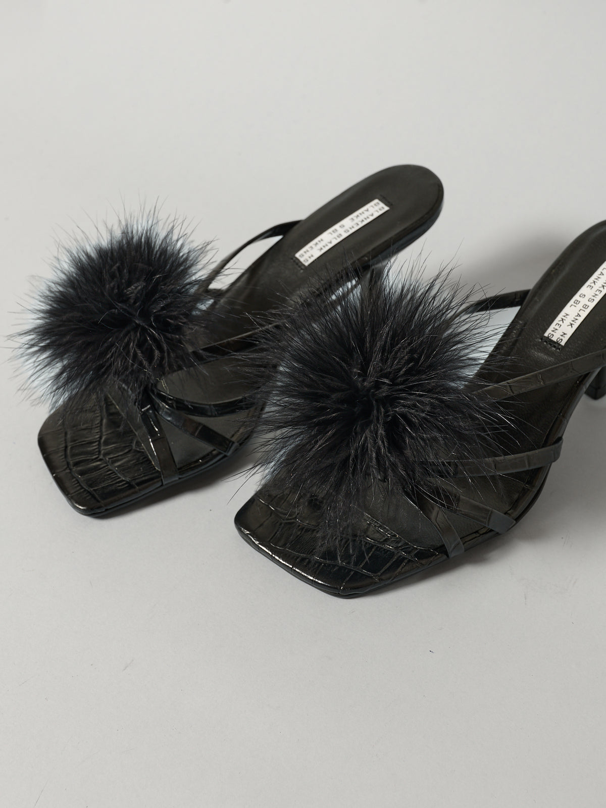 The Pom Pom Clip-ons Black Marabou