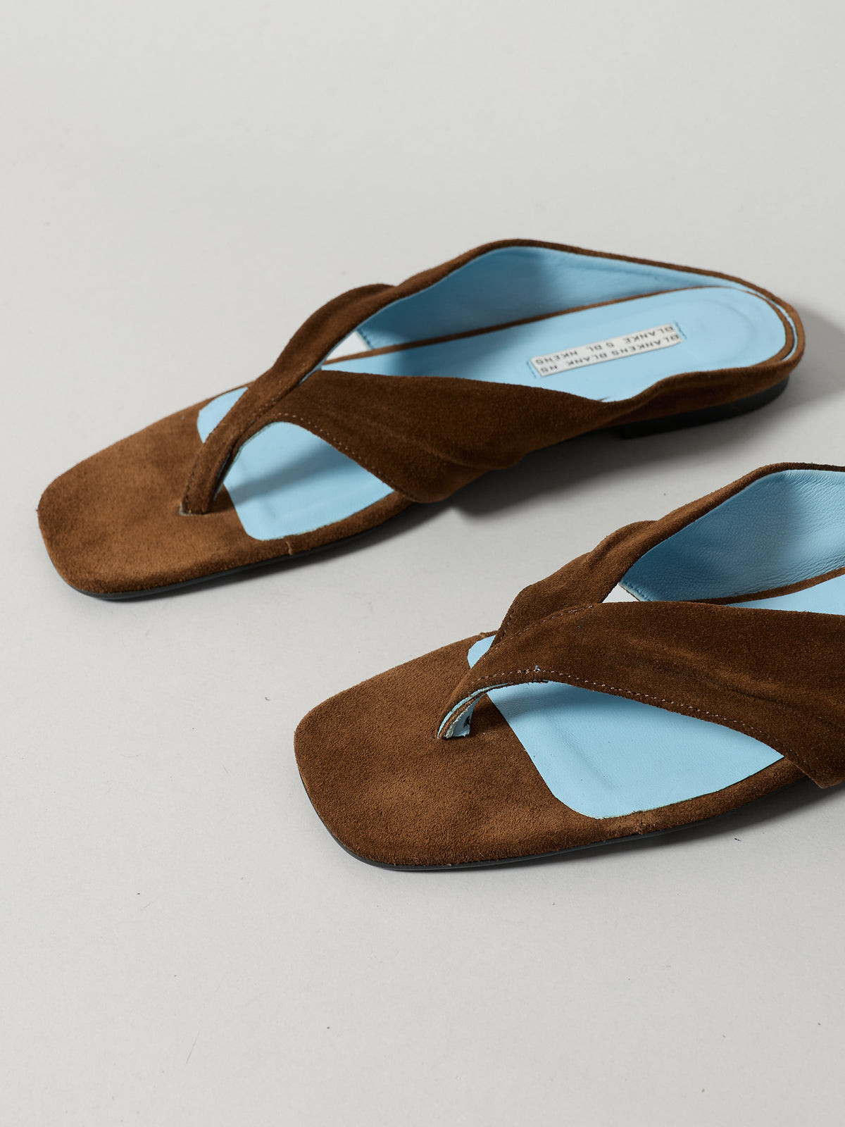 The Opal Brown Suede with Blue Leather Lining