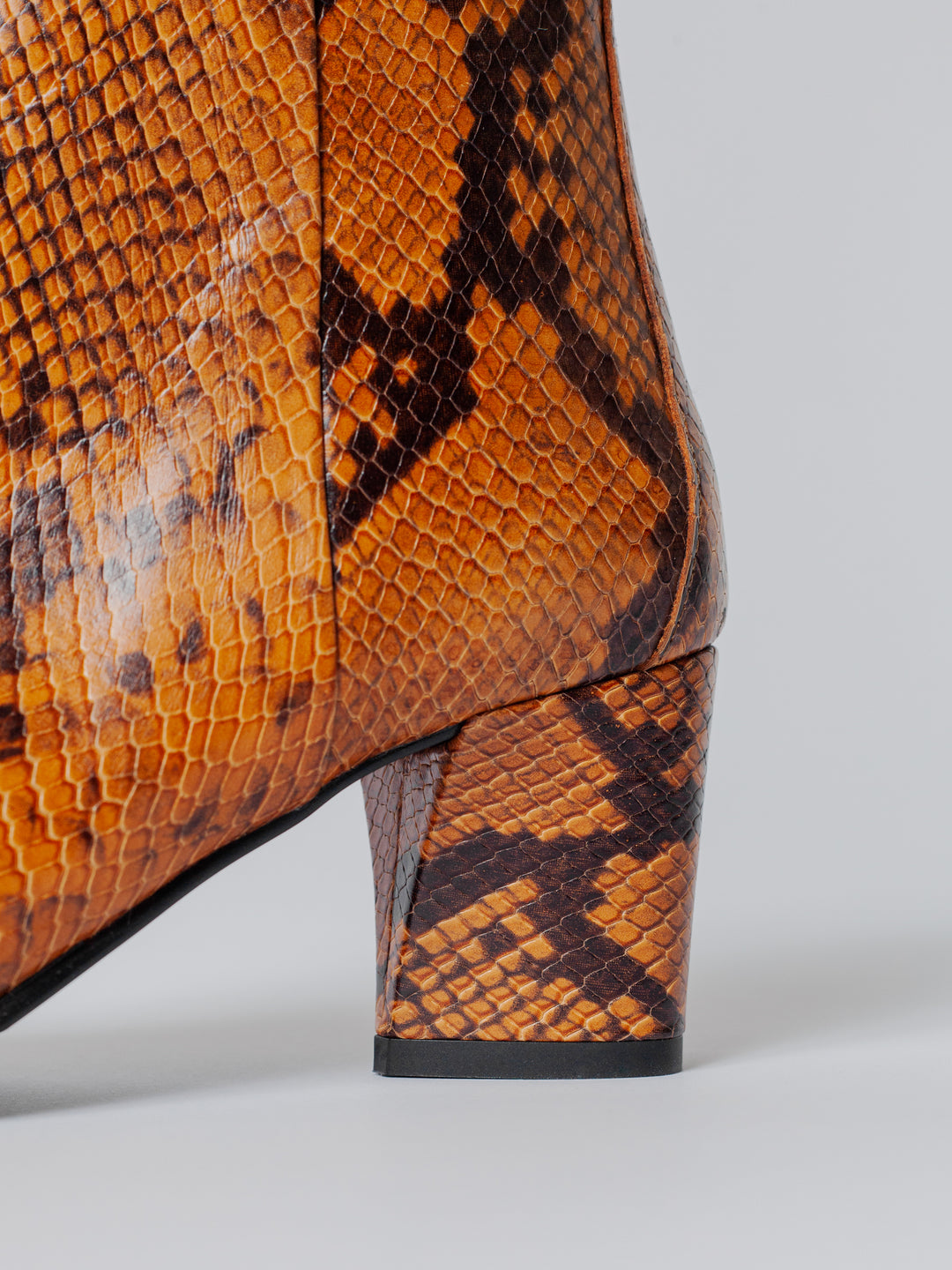 Blankens The Riverside Boot Serpent, Reptile embossed calf leather. Serpent embossed leather. Fall Winter boot.  Detail photo of heel.