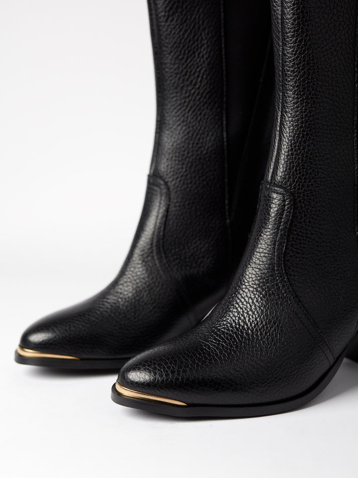 Blankens The Diana black heeled boot with gold detail in the front and zipper in the back